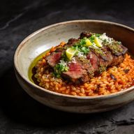 Dendê-Infused Farro Risotto with Herb-Crusted Lamb photo 1