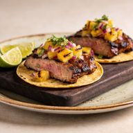 Adobo-Charred Pork Steaks with Smoky Pineapple Salsa photo 1