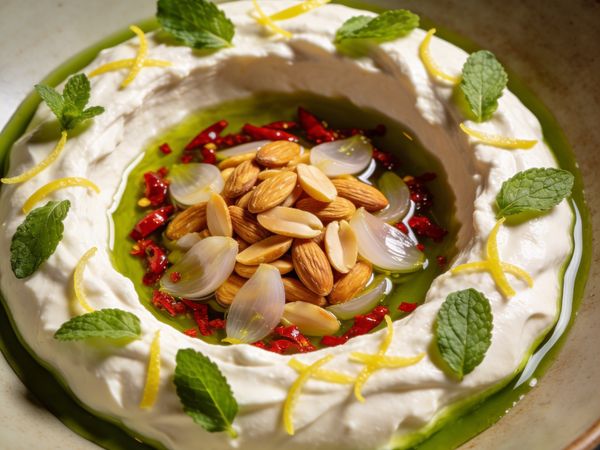 Chili-Crunch Almonds over Silk-Road Labneh