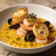 Provençal Seafood Bounty with Charred Corn & Pão de Queijo croutons photo 1
