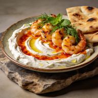 Sizzling Aleppo Shrimp over Lemon-Garlic Labneh photo 1