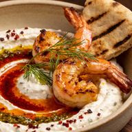 Hearth-Seared Aleppo Shrimp over Whipped Garlic Yogurt photo 1