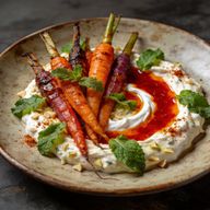 Sizzling Maras Butter Carrots over Garlic Labneh photo 1