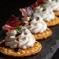 Socca Blinis with Whipped Burrata & Prosciutto Shards photo 1