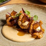 Smoked Tallow Emulsion on Crispy Chicharrón photo 1