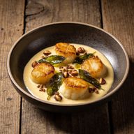 Parisian Gnocchi with Taleggio Fonduta & Smoked Hazelnut photo 1