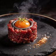 Cold-Smoked Beef Tartare with Cured Quail Yolk photo 1